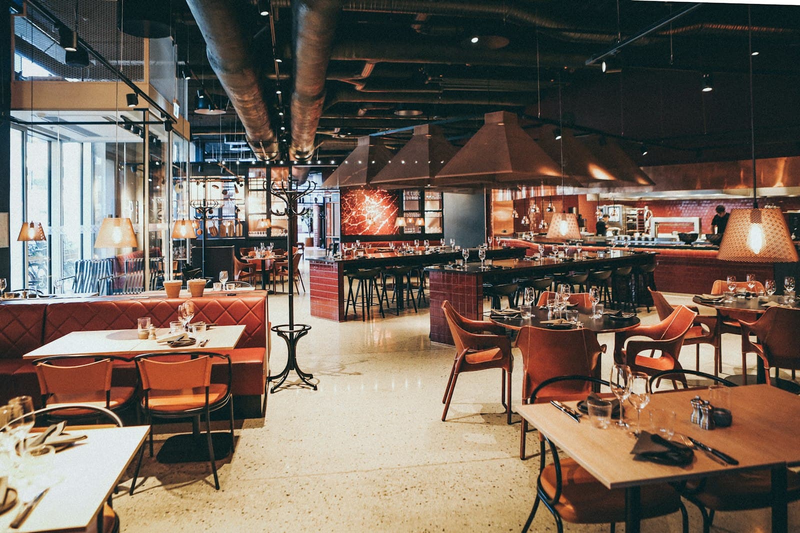 Stock photograph of a dim, intimate restaurant interior; not Ember Table.
